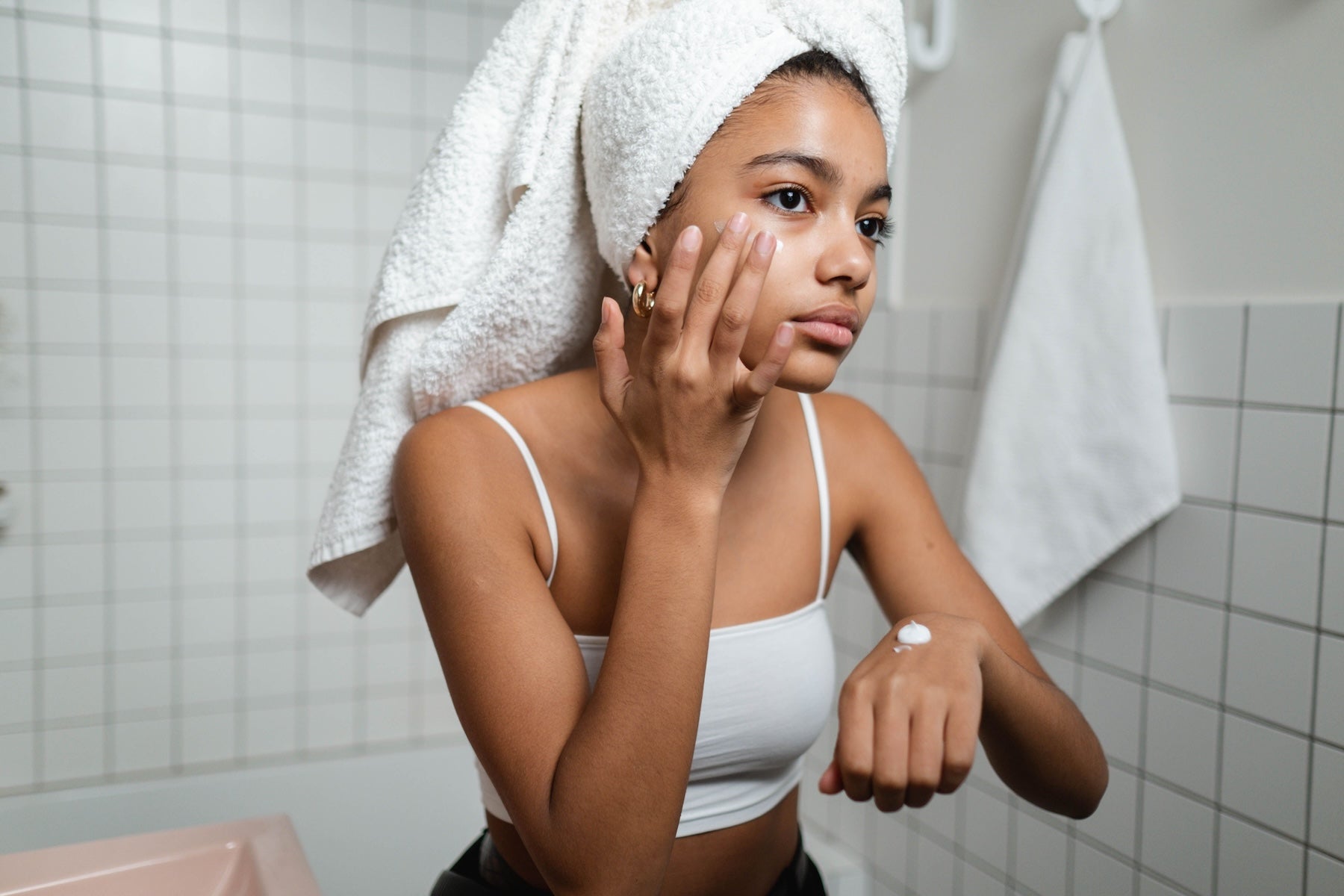 Woman washing her face 