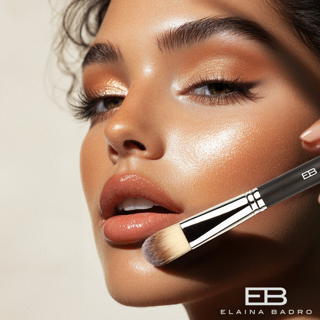 Woman using Elaina Badro makeup brush.